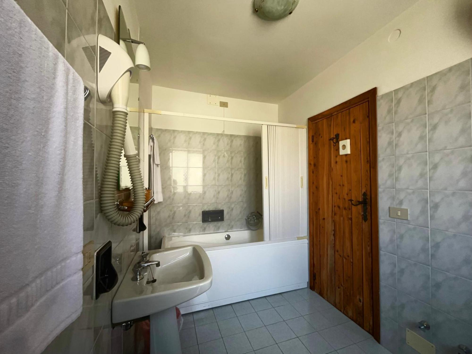 Hotel Garni Mille Pini Сканно Екстер'єр фото