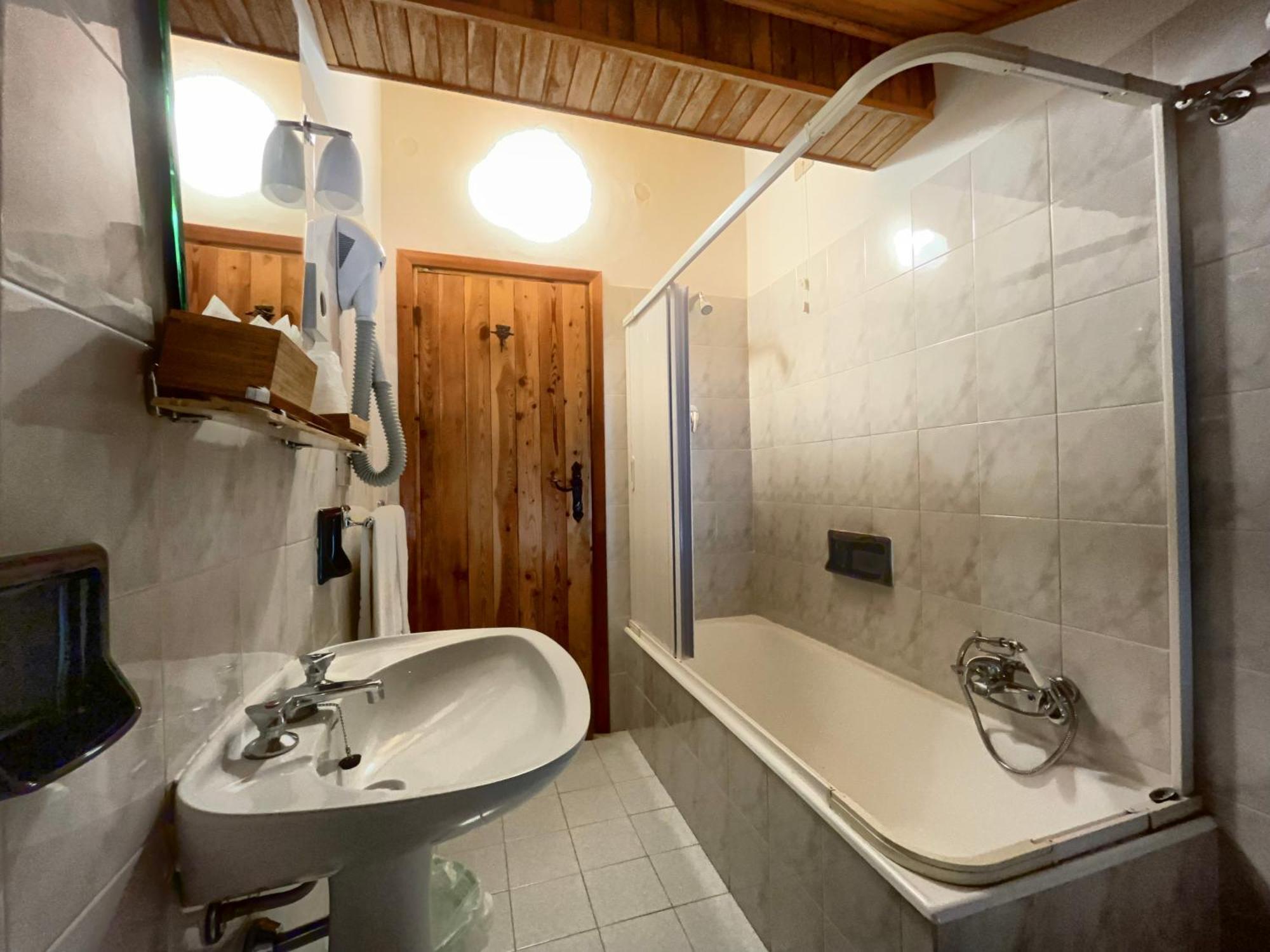 Hotel Garni Mille Pini Сканно Екстер'єр фото